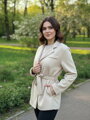 Beżowy płaszcz do wiązania