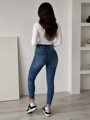 Dámske modré skinny rifle MSARA S0713-3 s motýľom