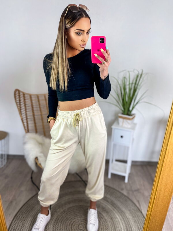 Damen-Jogginghose aus Velours in Cremefarbe Damen-Jogginghose aus Velours in Cremefarbe